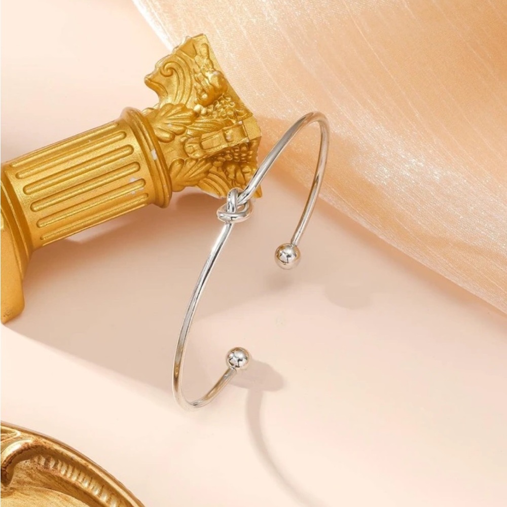 Sleek Silver Knot Bangle Bracelet - Picture 2 of 2